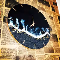 ساعت رزینی طرح دریا مشکی با شن طبیعی 