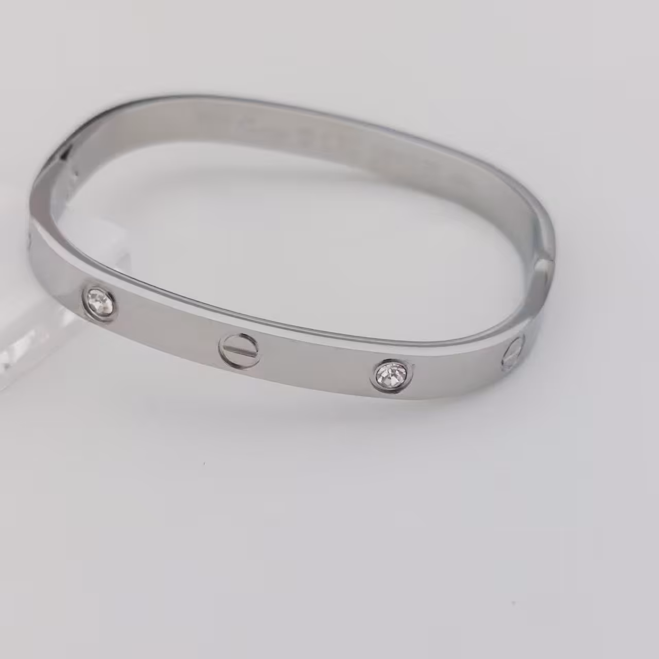 دستبند بنگل کد11209 طرح طلا.مربعی نگین دار.تمام استیل.آبکاری طلا.رنگ ثابت.ضدحساسیت