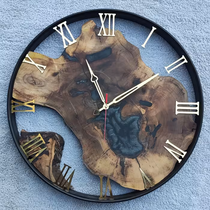 ساعت دیواری چوب و رزین قطر 50فریم چوبی مشکی اعداد و عقربه مولتی استایل موتور  آرام گرد و بی صدا با ضمانت 3 سال 