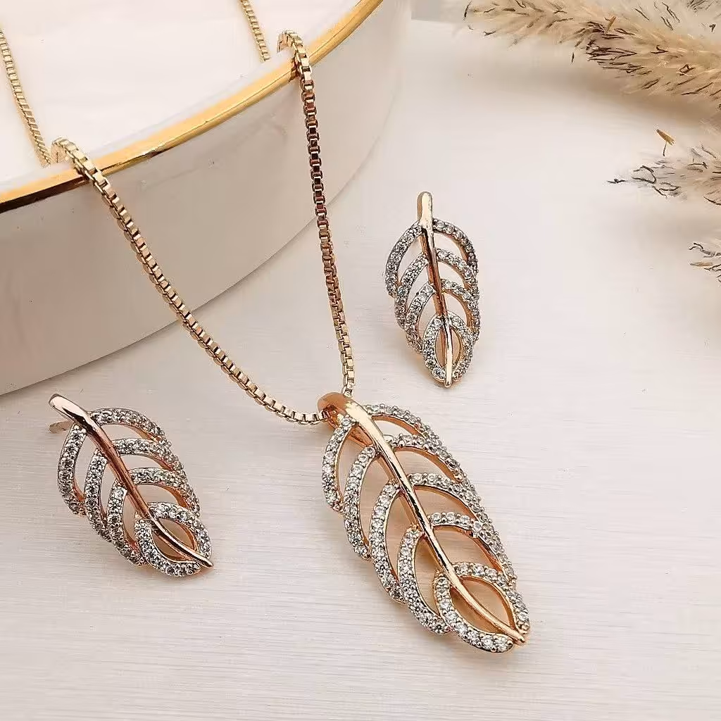 نیم ست ژوپینگ اصل. تضمین اصالت کالا. رنگ ثابت. آبکاری طلای 18 عیار