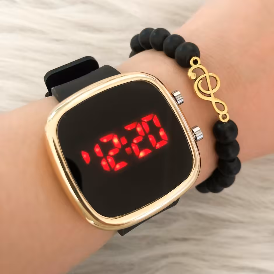 ست ساعت ال ای دی بند ژله ای مربع مشکی قاب طلایی به همراه دستبند مهره مشکی