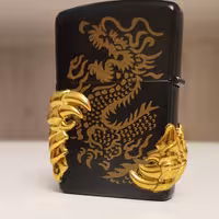 فندک فلزی گازی سنگ چخماقی  طرح پنجه  اژدها بسیار زیبا  