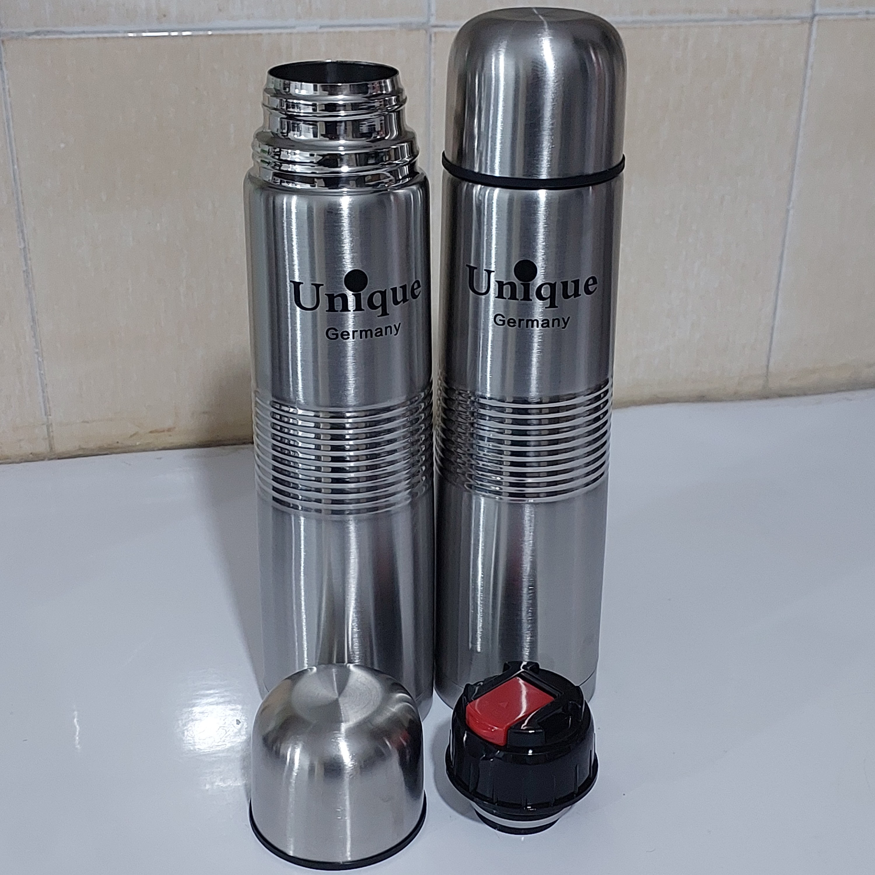 فلاسک 1 لیتری یونیک اصلی ( مقایسه شده با فیک) دارای کیف حمل