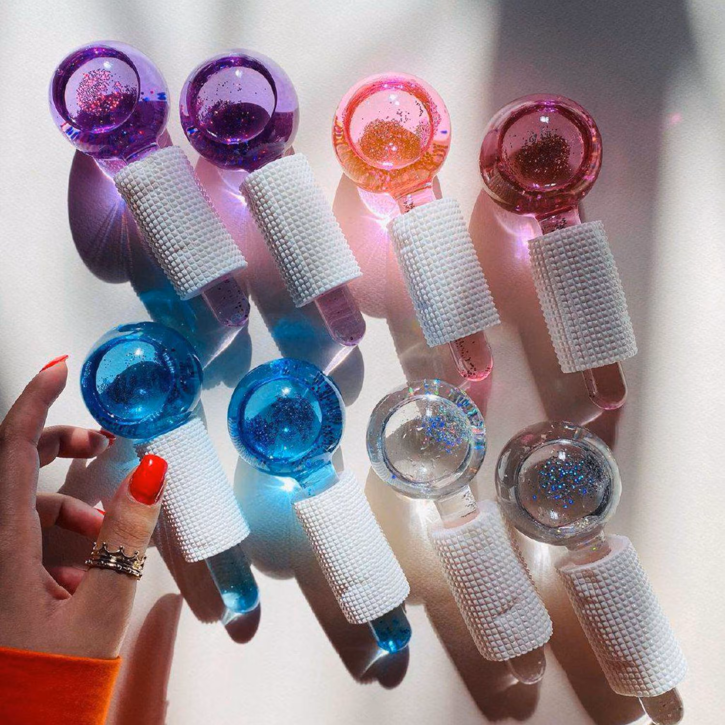 ماساژور آیس گلوب شاین دار ( گوی یخی ) رنگ قرمز (تکی)