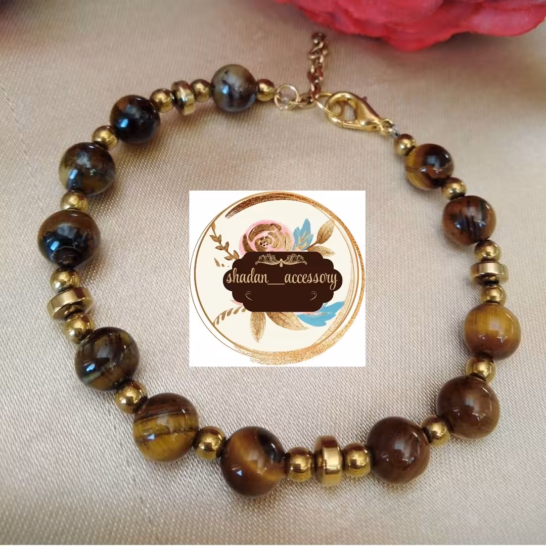 دستبند سنگ چشم ببر و حدید طلایی زیورآلات دستساز زنانه مردانه