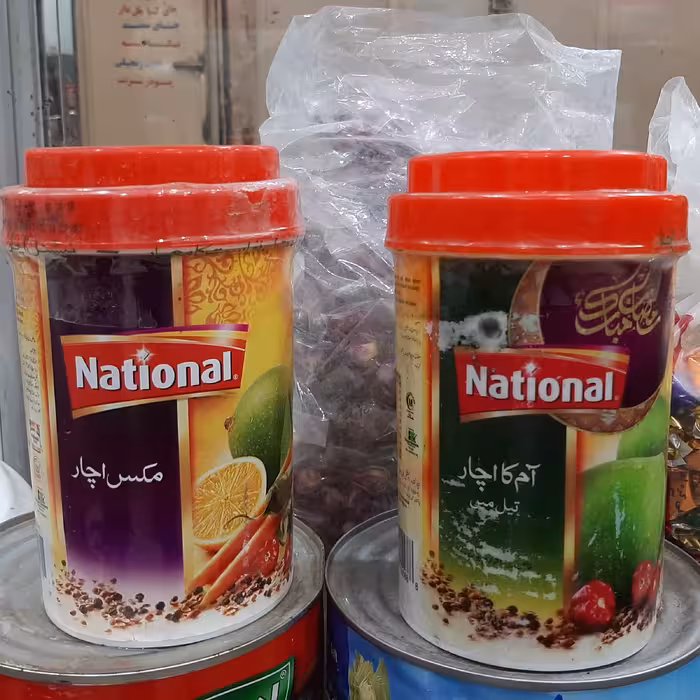 دو عدد ترشی انبه خارجی با روغن زیتون یک کیلو گرمی مارک ناسیونال اورجینال محصول پاکستان با دو طعم خالص و مخلوط 