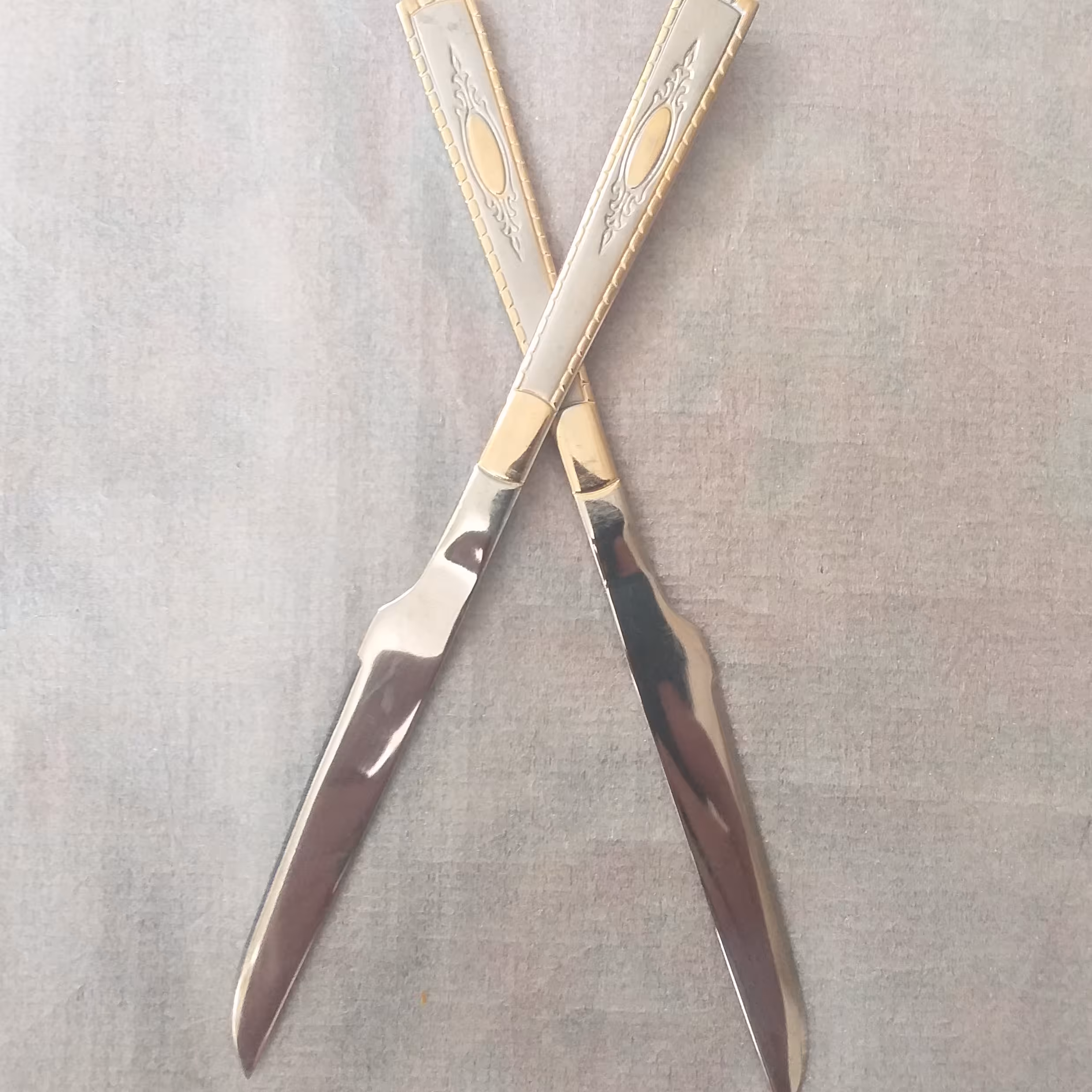 چاقو یونیک استیل دورطلایی