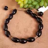 دستبند سنگ اونیکس مدل بیضی و رینگ های نقره