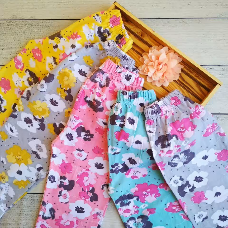 شلوار راحتی دخترانه طرح شقایق | جنس پنبه لاکرا در 5 رنگ ( سایز 75 تا 90 )