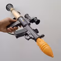 اسباب بازی آر پی جی کاور دار به همراه 2سری پرت شونده تفنگ اسباب بازی 