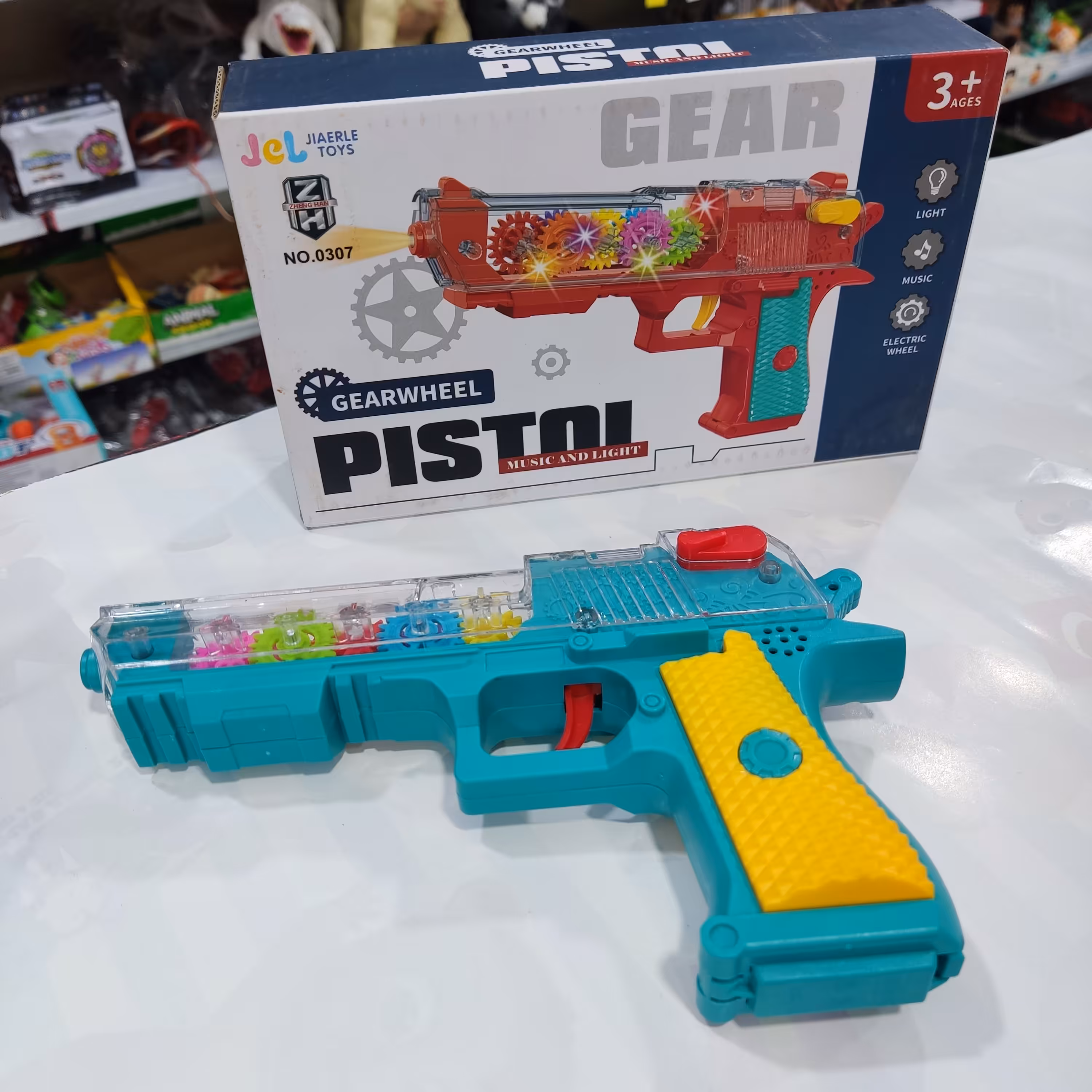 اسباب بازی تفنگ موزیکال چرخ دنده ای