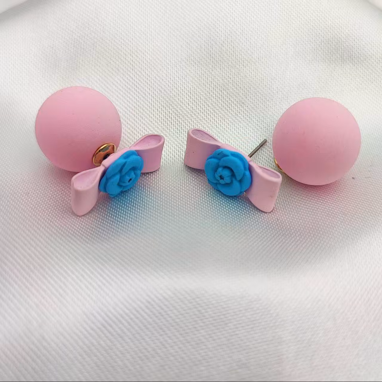 ازسال رایگان گوشواره توپی صورتی پاپیون دار