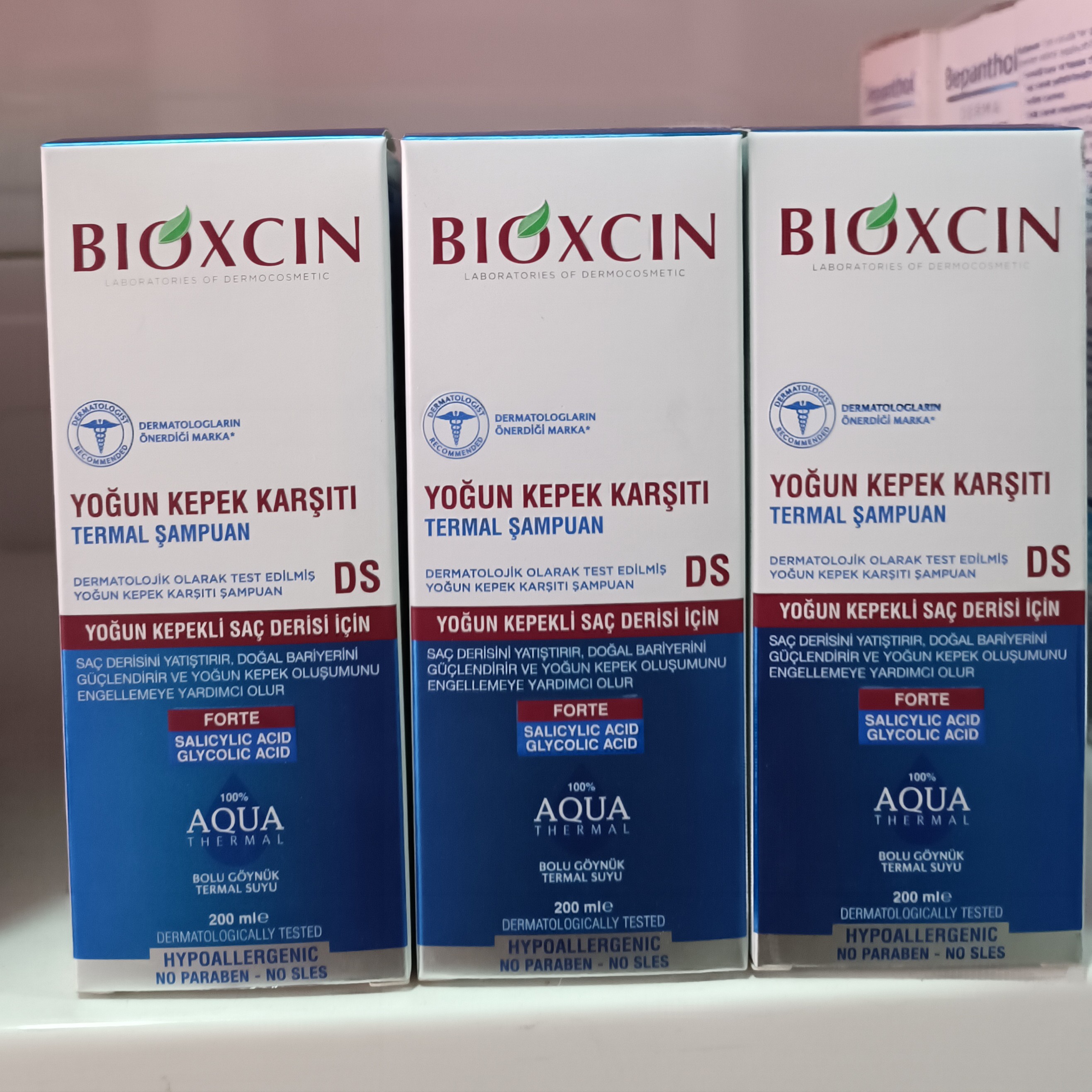 شامپو ضد شوره و بدون سولفات بیوکسین مدل آکوا حجم 200 میل BIOXCIN