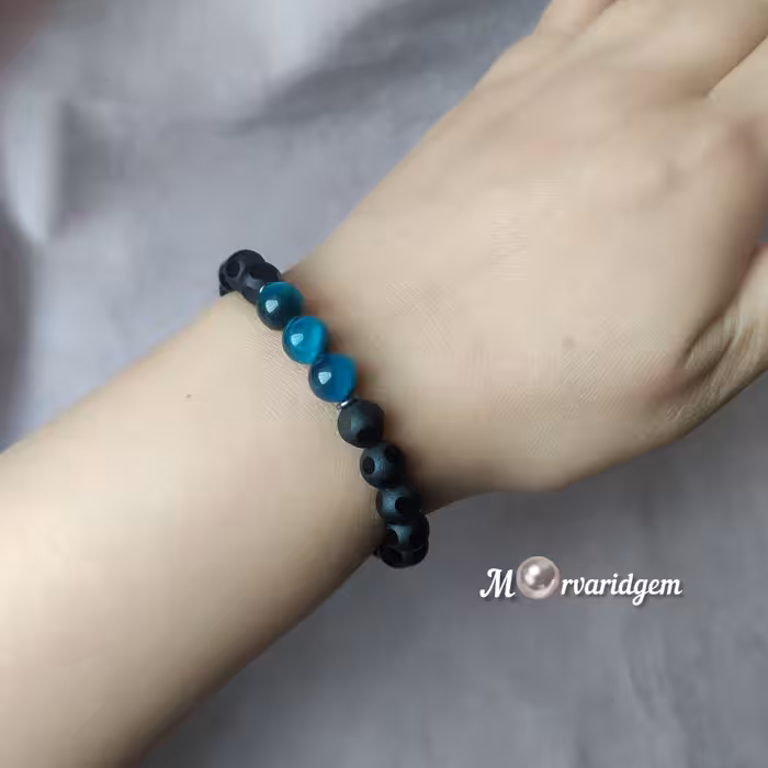 دستبند سنگ اصل چشم ببر آبی و اونیکس تراش  دایره ای.  اسپورت