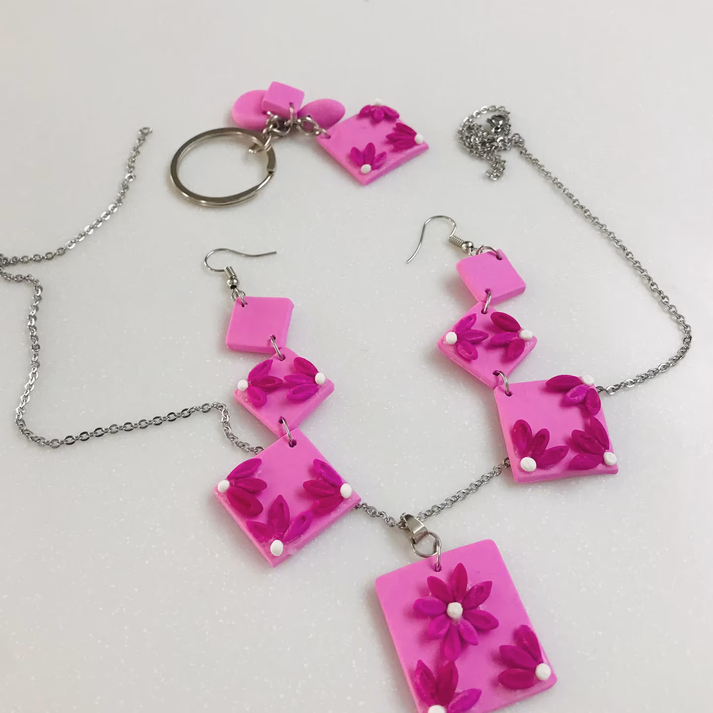 گوشواره و اویز و جاسوییچی گل بنفشه