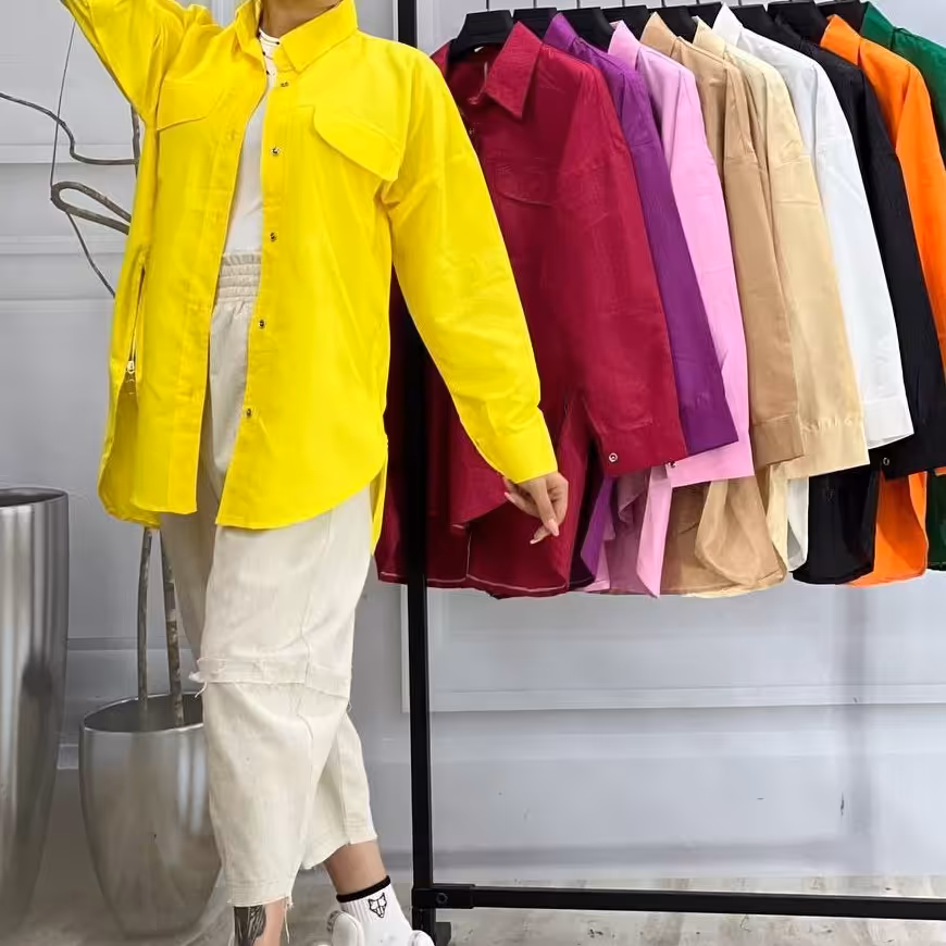 مانتو زنانه بغل زیپ فری سایز مناسب 38تا44 جنس داکرون پوست ماری 