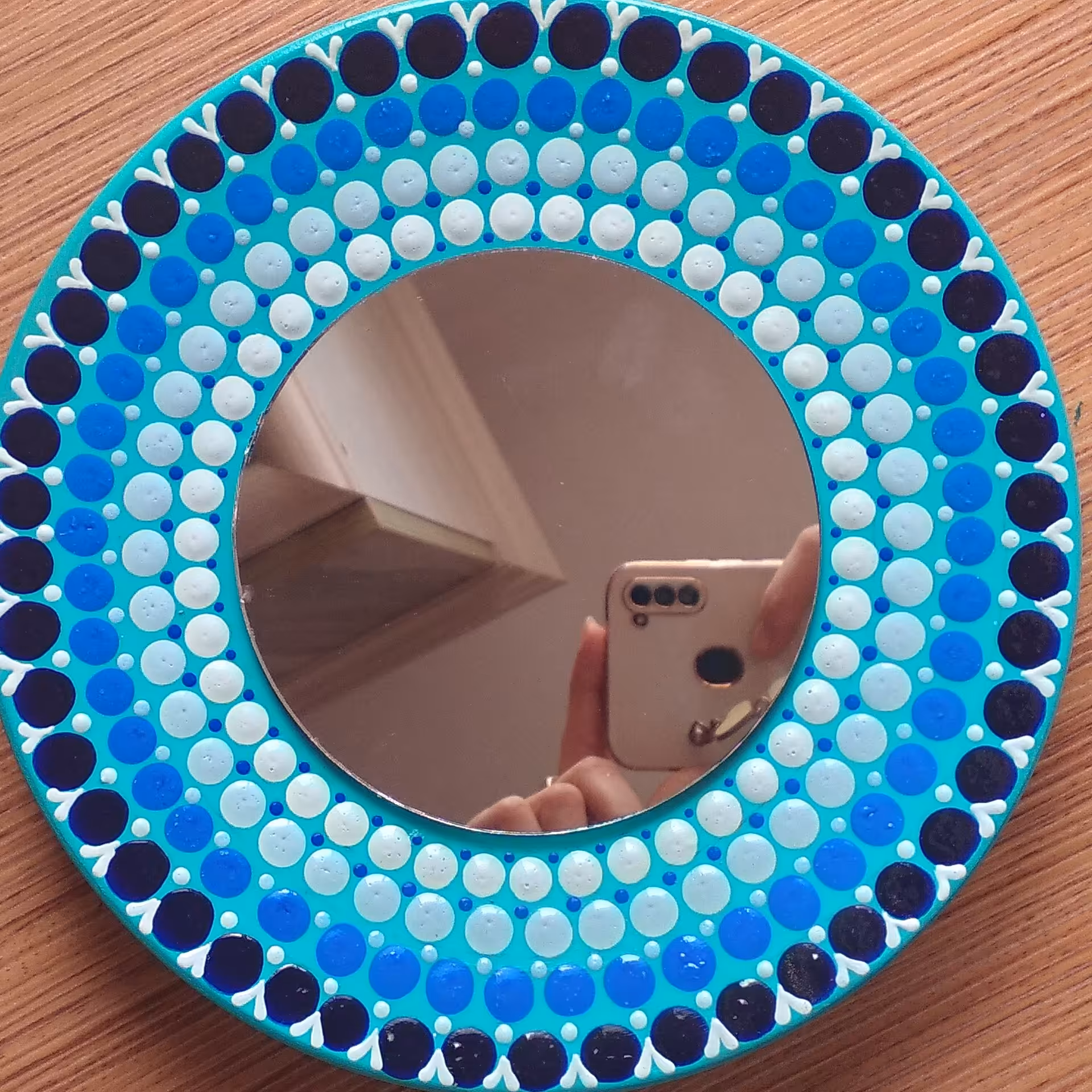 ایینه نقطه کوبی شده