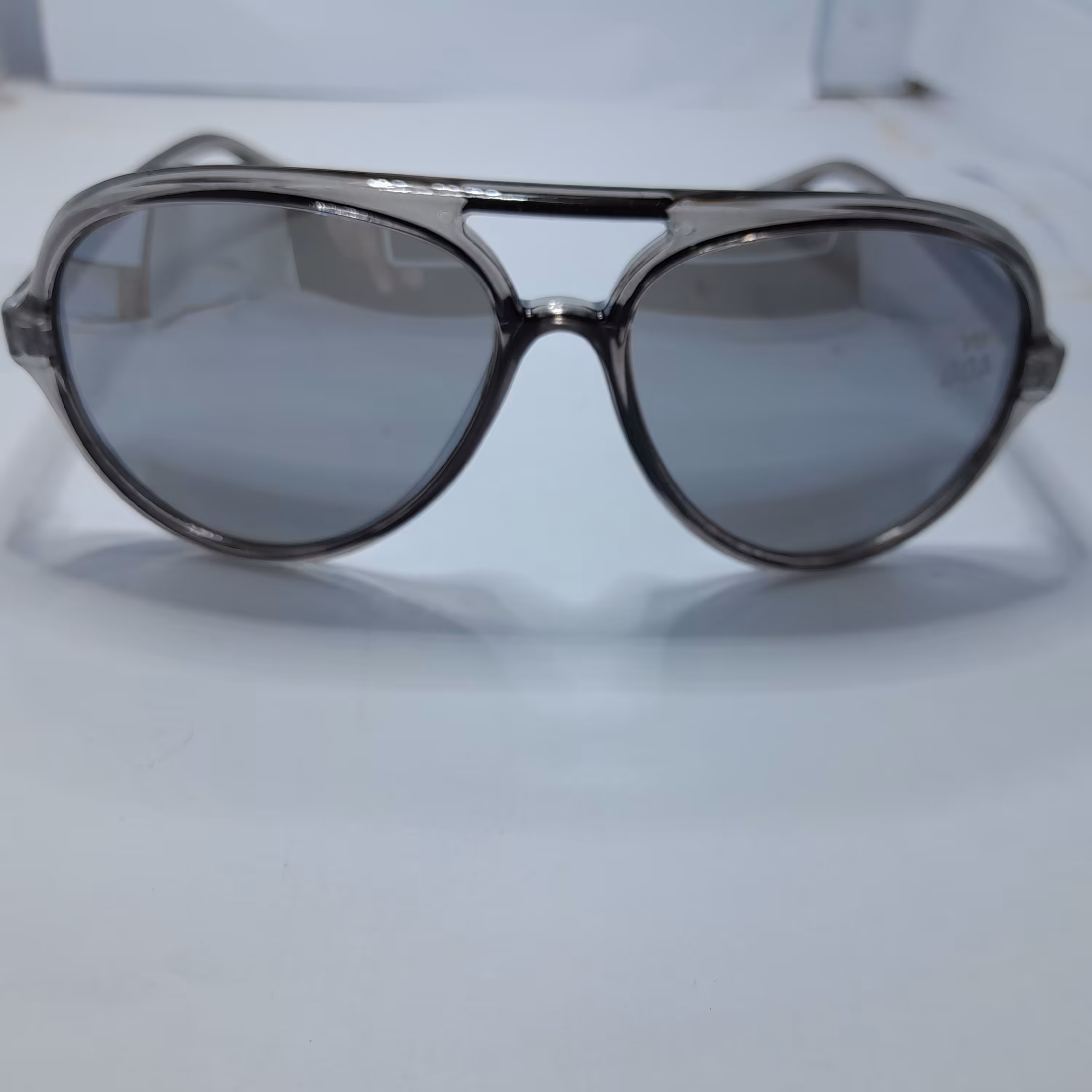 عینک آفتابی زنانه برند اکسسوری آلمان   رنگ طوسی بیضی شکل 