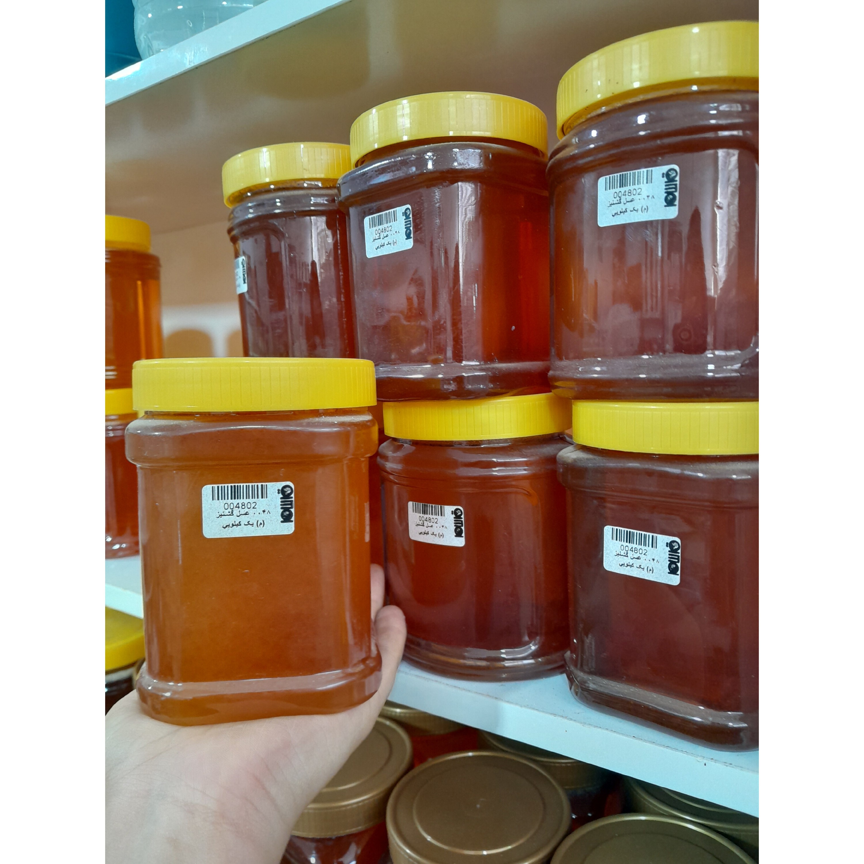 عسل گشنیز 1 کیلویی درجه یک