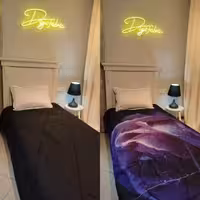 لحاف یک نفره طرح گل بنفش و مشکی ساده