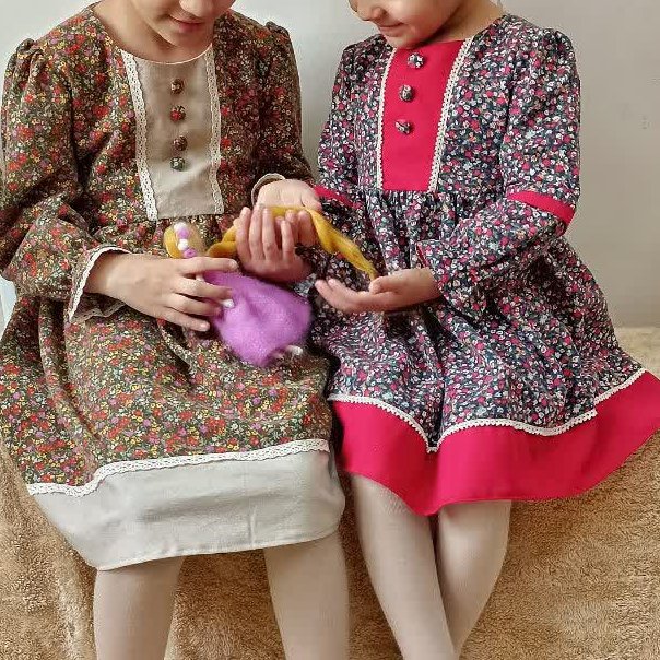 پیراهن دخترانه مجلسی شیکترکیب های گلدار ساده،تور کتون در قسمت دامن و استین دوخته شده