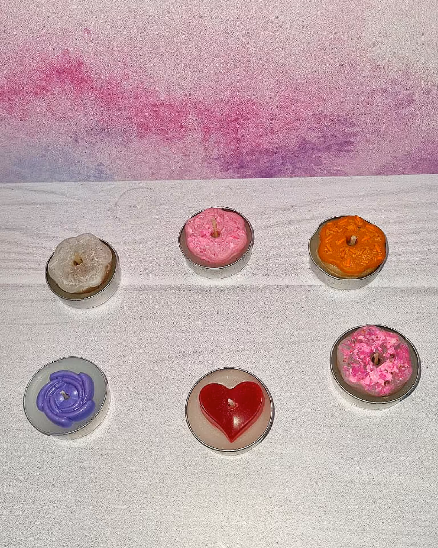 شمع دست ساز طرح وارمر دونات قلب گل