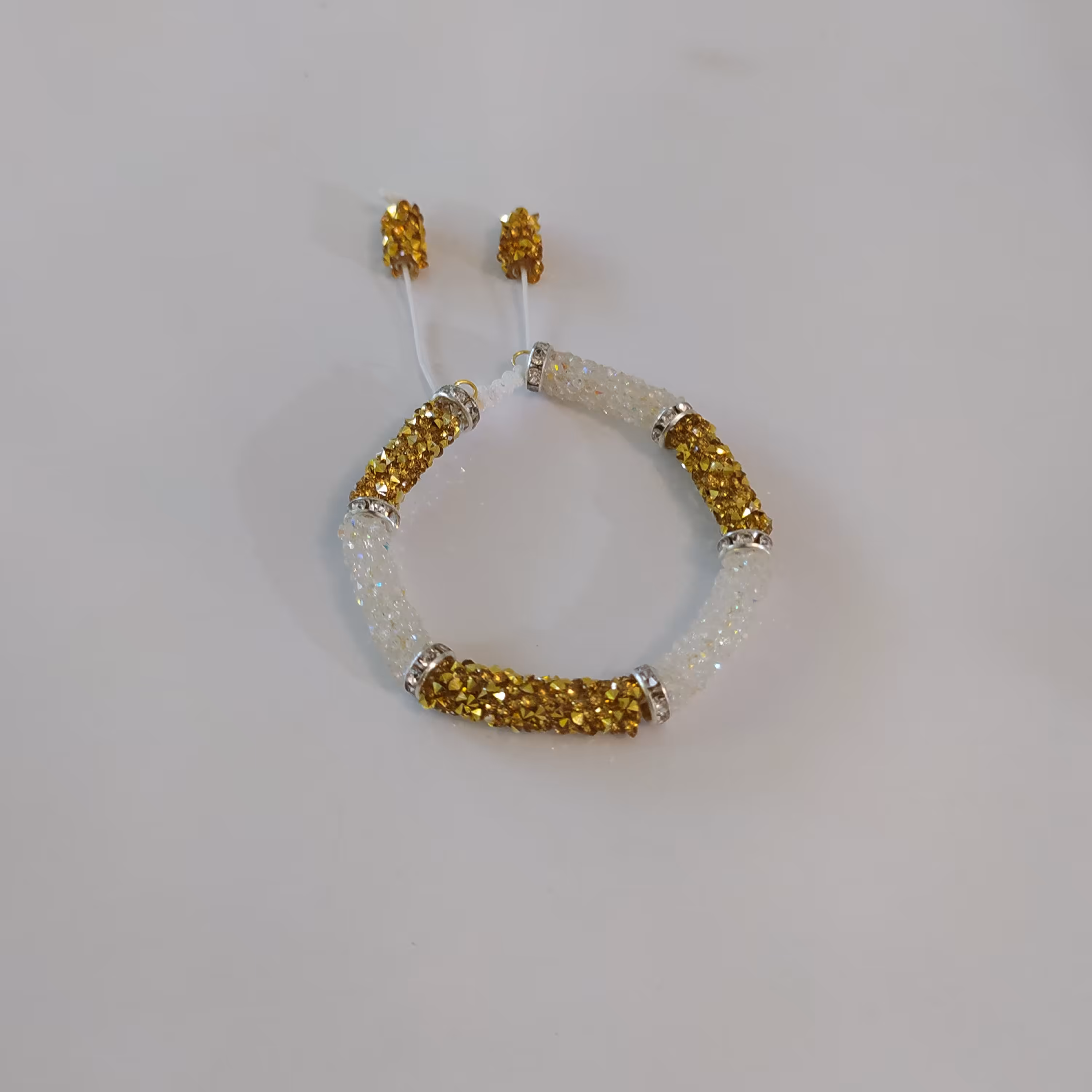 دستبند سواروسکی سفید و طلایی