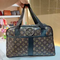 ساک دستی زنانه طرح ال وی آستردوزی شده