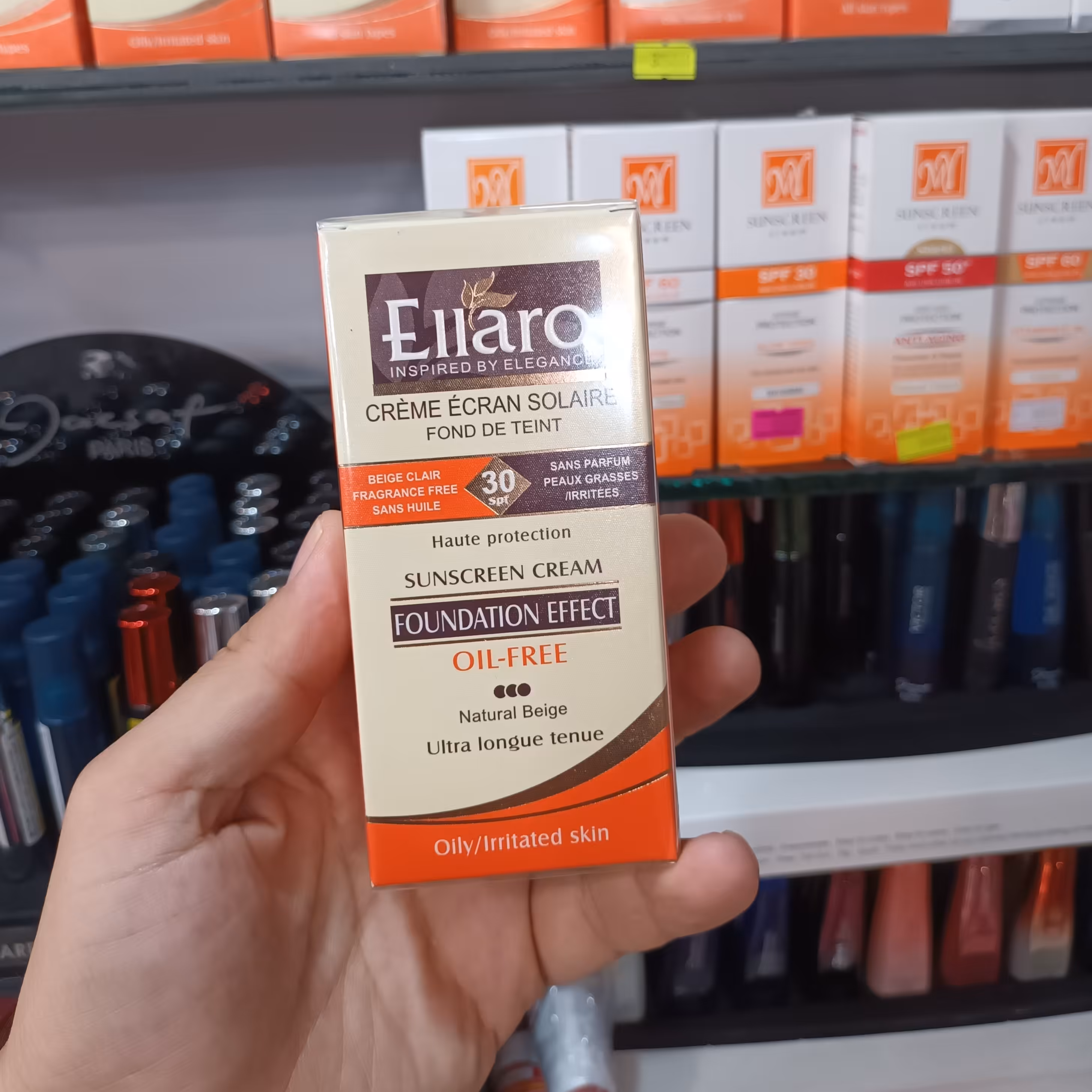 کرم ضد آفتاب بژ طبیعی فاقد چربی سه نقطه الارو spf30