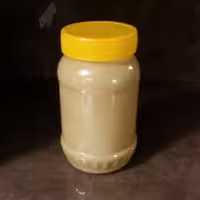 ارده دوآتشه  ممتاز  آسیاب سنگی(700گرمی)برکت شمال