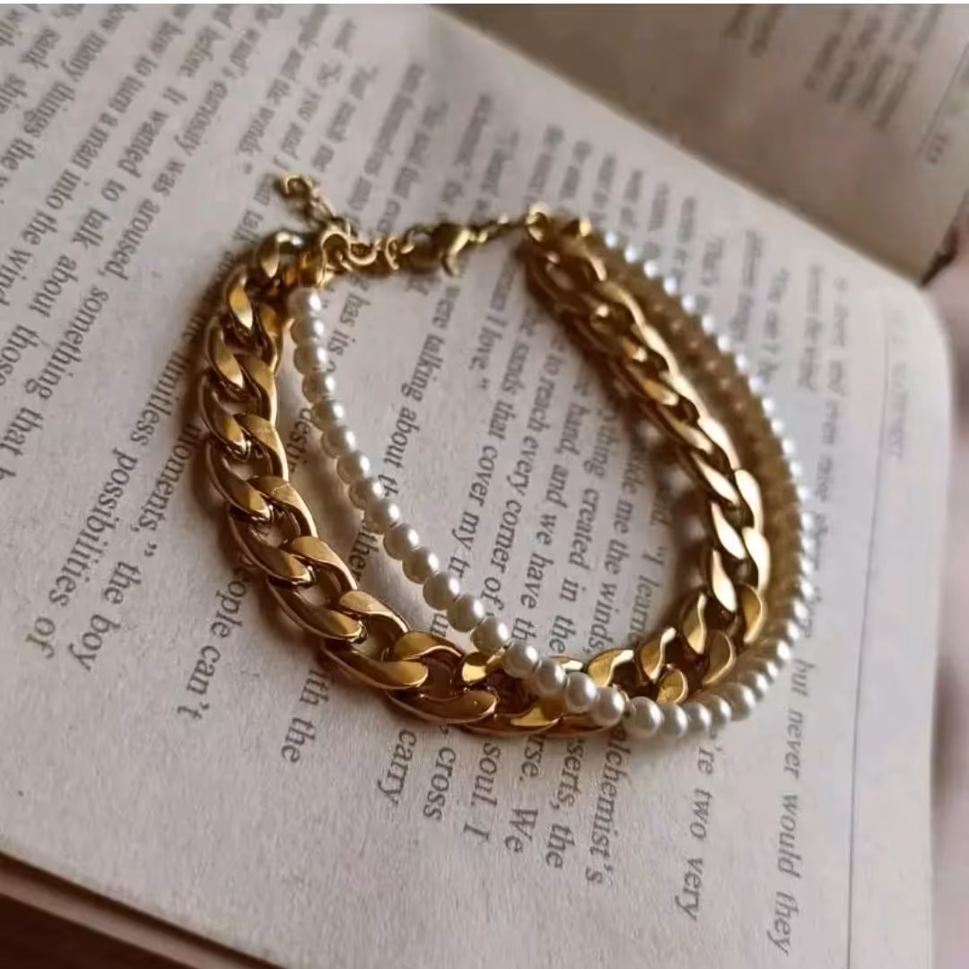 دستبند کارتیر و مروارید استیل