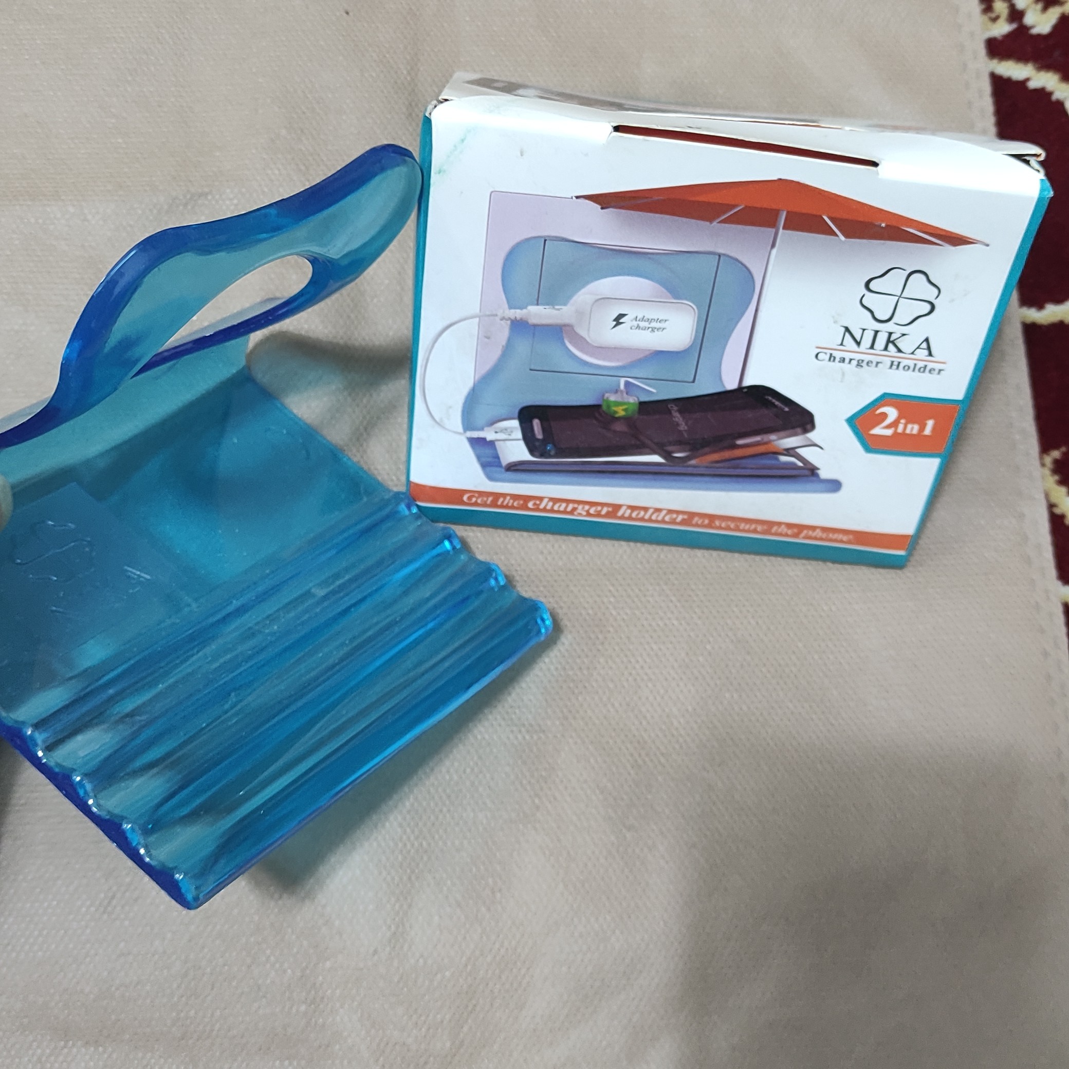 پایه نگهدارنده موبایل 2 کاره مدل نیکا آبی رنگ 100 گرمی