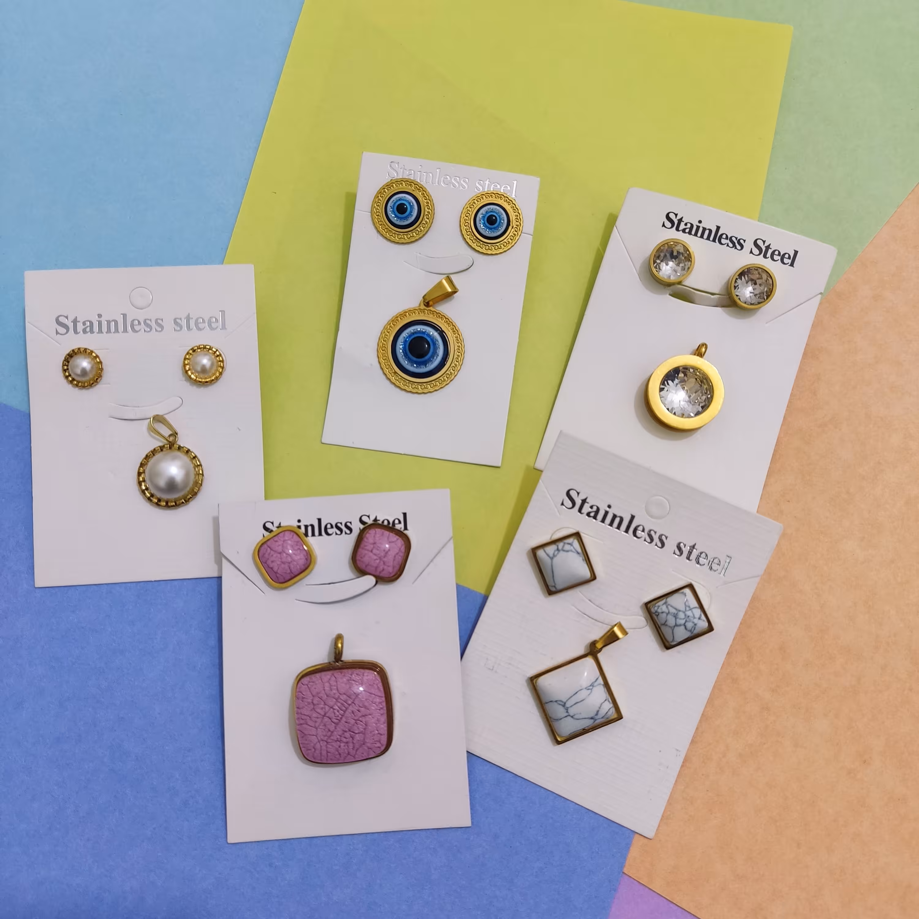  نیم ست استیل  گردنبند گوشواره با زنجیر