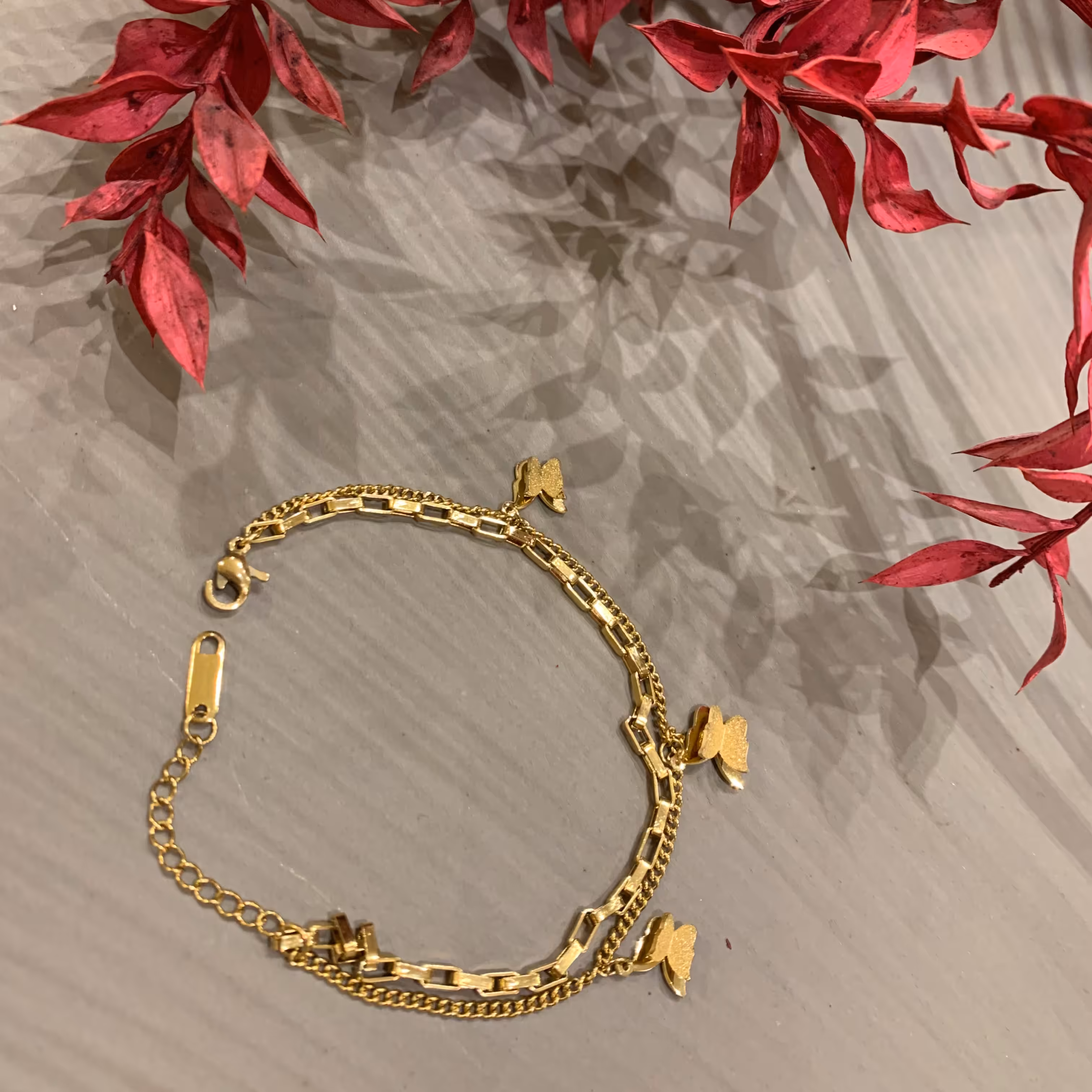 نقره و بدلیجات دستبند استیل طلایی 