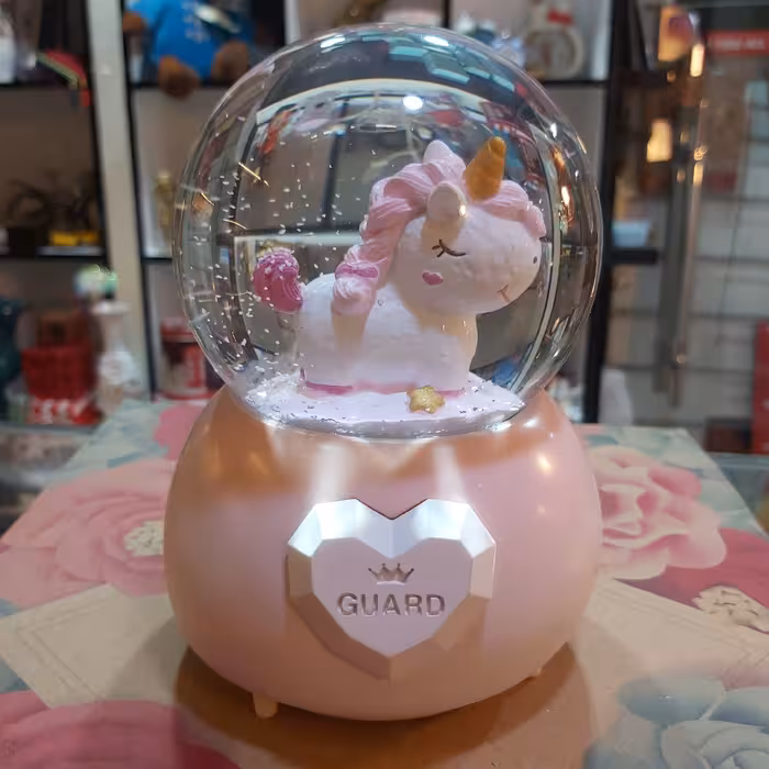 گوی موزیکال برفی پمپی اسب تک شاخ صورتی بزرگ خارجی