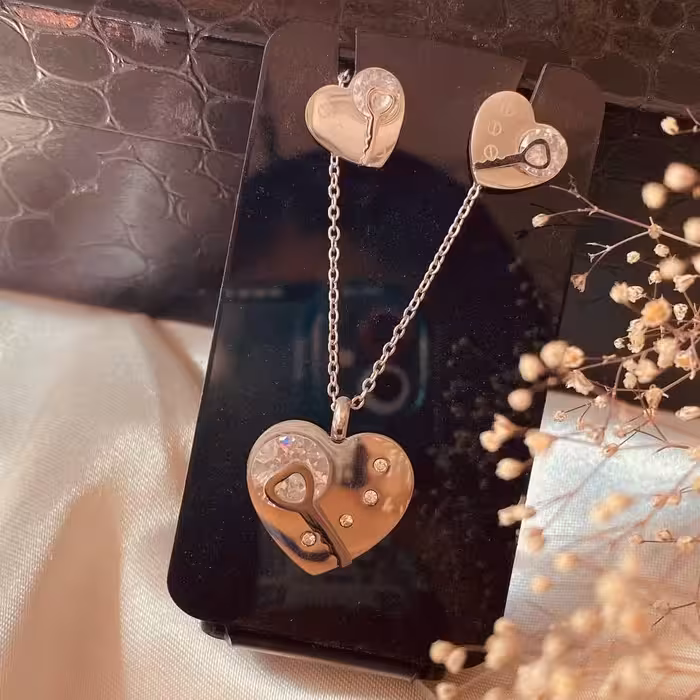 نیم ست مدل قلب و کلید و نگین استیل رنگ ثابت