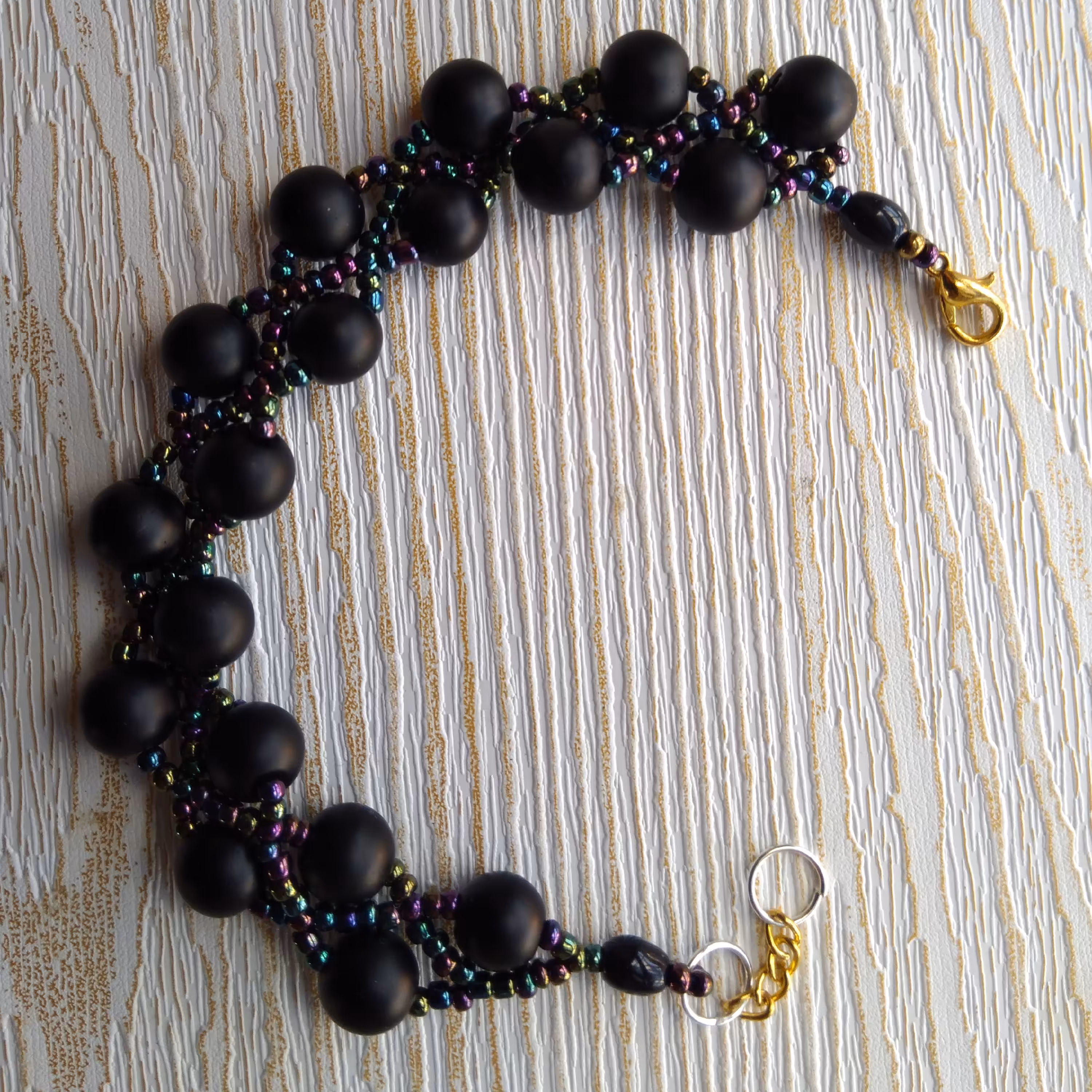 دستبند ویژه ارسال رایگاااان.  -سنگ اونیکس منجوق هفت رنگ شیک و درخشان