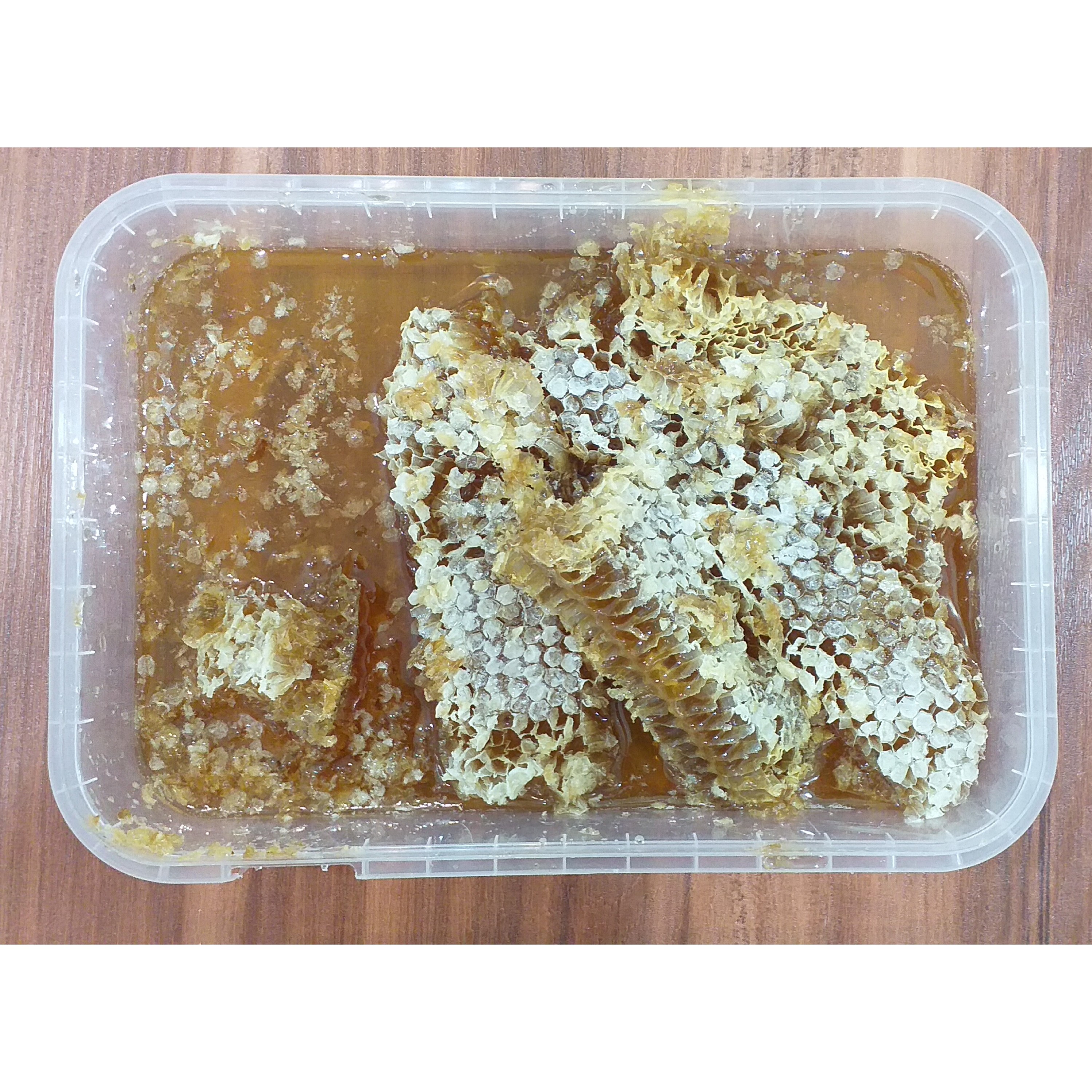 عسل موم دار صددرصد طبیعی بسته 1000گرمی