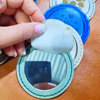 آینه جیبی چرمی.دستدوز با چرم طبیعی و مصنوعی دررنگبندی متنوع