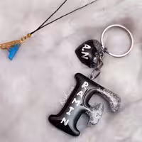 جاکلید رزینی و آویز گوشی