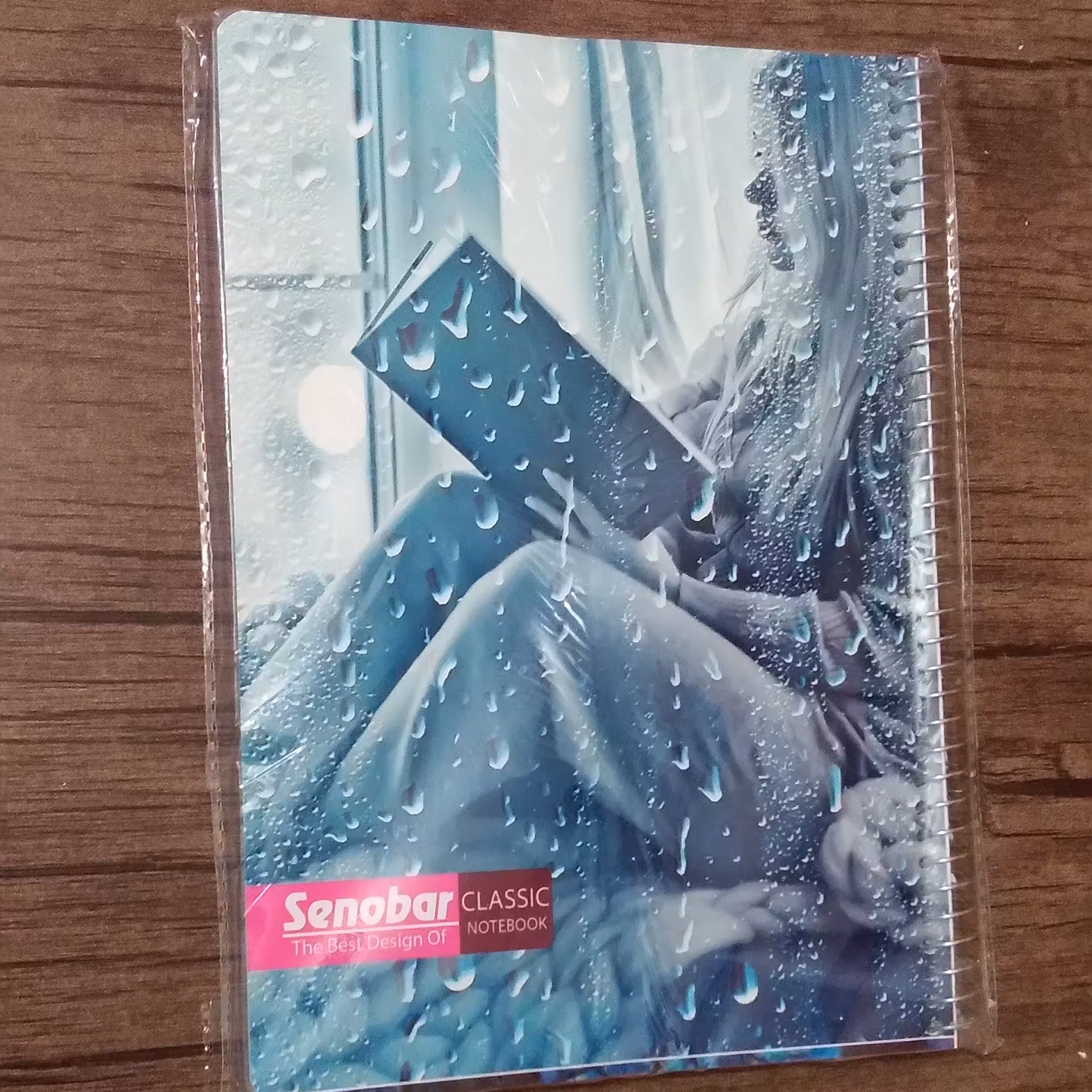 دفتر مشق 100 برگ سیمی صنوبر طرح دختر بارانی جلد طلقی