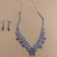 حراج گردنبند و گوشواره سرمه ای 