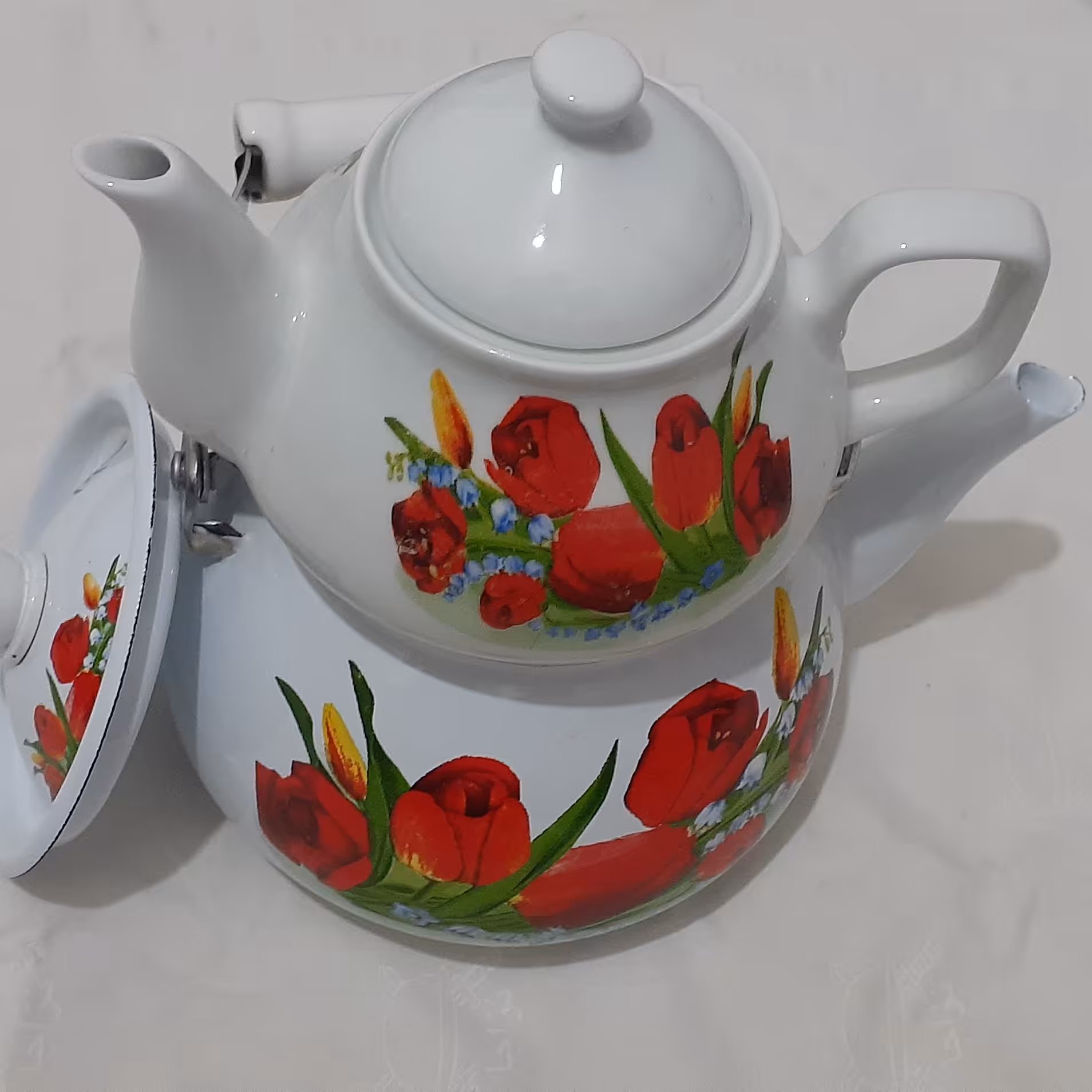 کتری و قوری رسا کتری یک و نه دهم لیتر لعابی و قوری نه دهم لیتر چینی  گادار