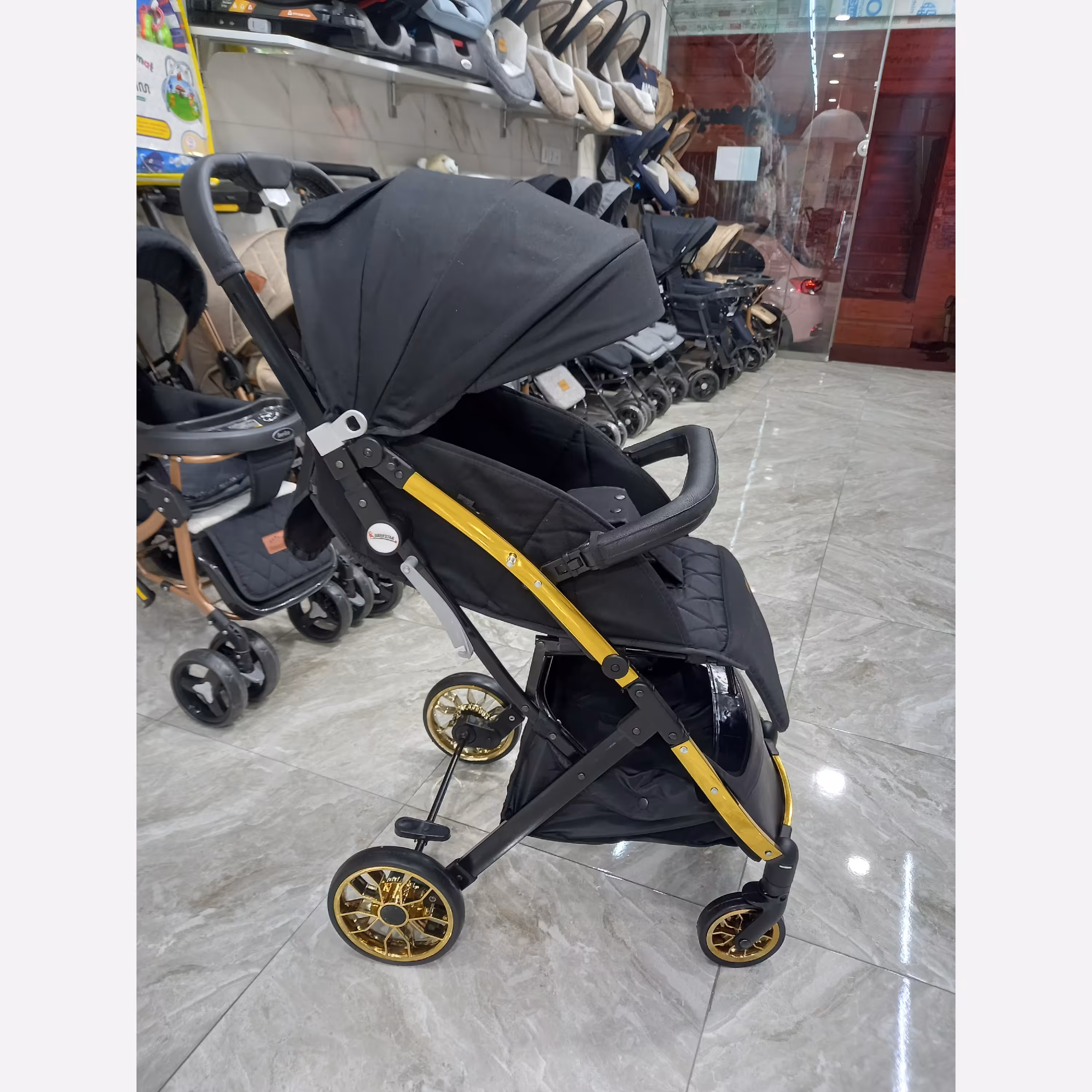  کالسکه ریچ کیدز مدل پرو بدنه طلایی 