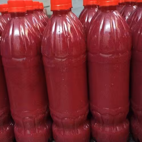 زرشک آب زرشک طبیعی(یک لیتری)( زرشک قرمز رنگ)(  بدون هیچ افزودنی )