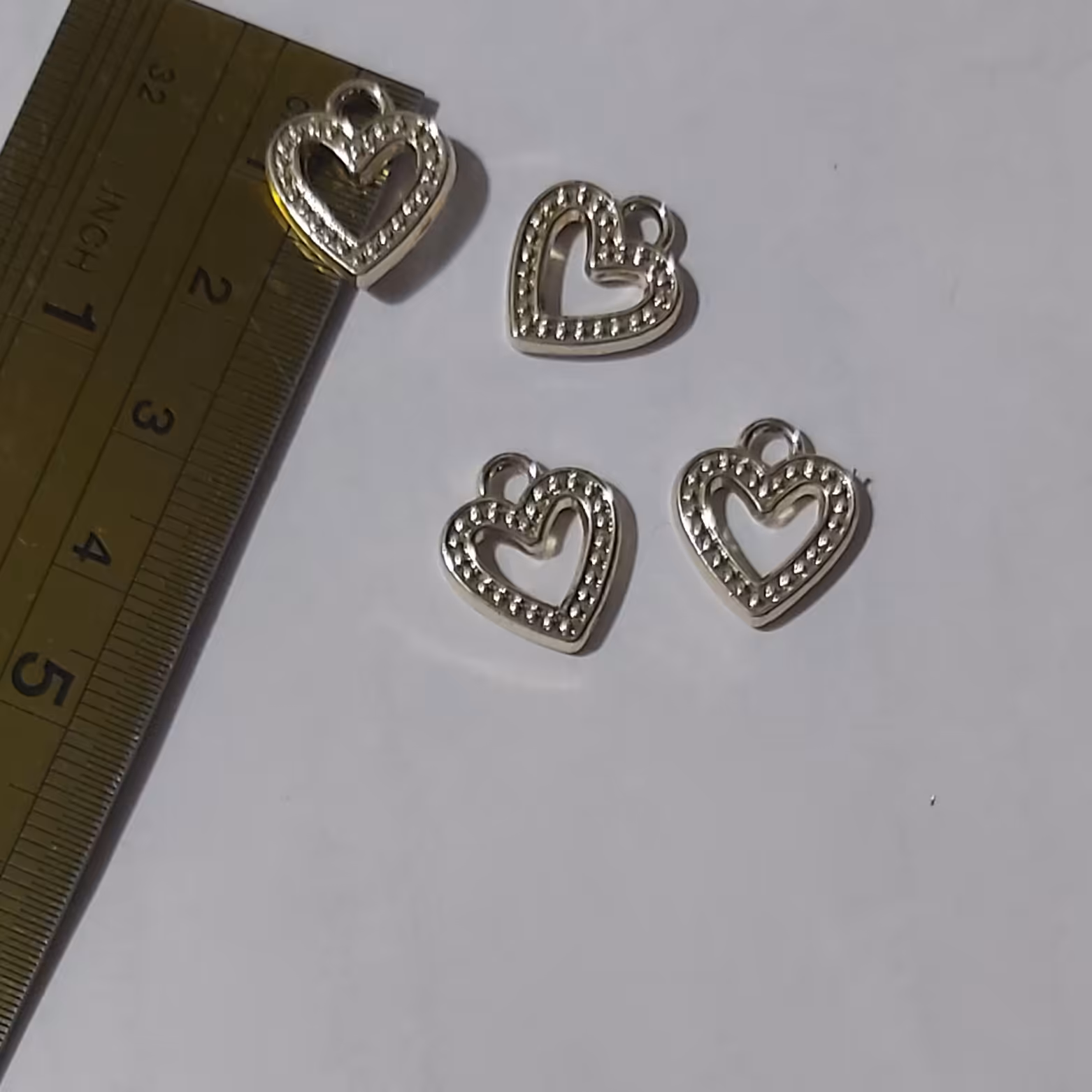 آویزقلب   فلزی نقره ای یک ونیم سانت یک عدد