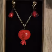 نیم ست دانه اناری  با گیره و زنجیر استیل رنگ ثابت و ضد حساسیت