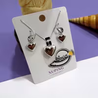 نیم ست برند Xuping از جنس مس و روکش رادیوم بسیار با کیفیت طرح قلب تو پر ظریف کاملا مشابه طلا