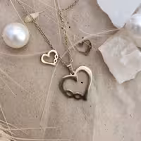 نیم ست استیل دخترانه و زنانه کاملا مشابه طلا طرح (قلب) برند ژوپینگ