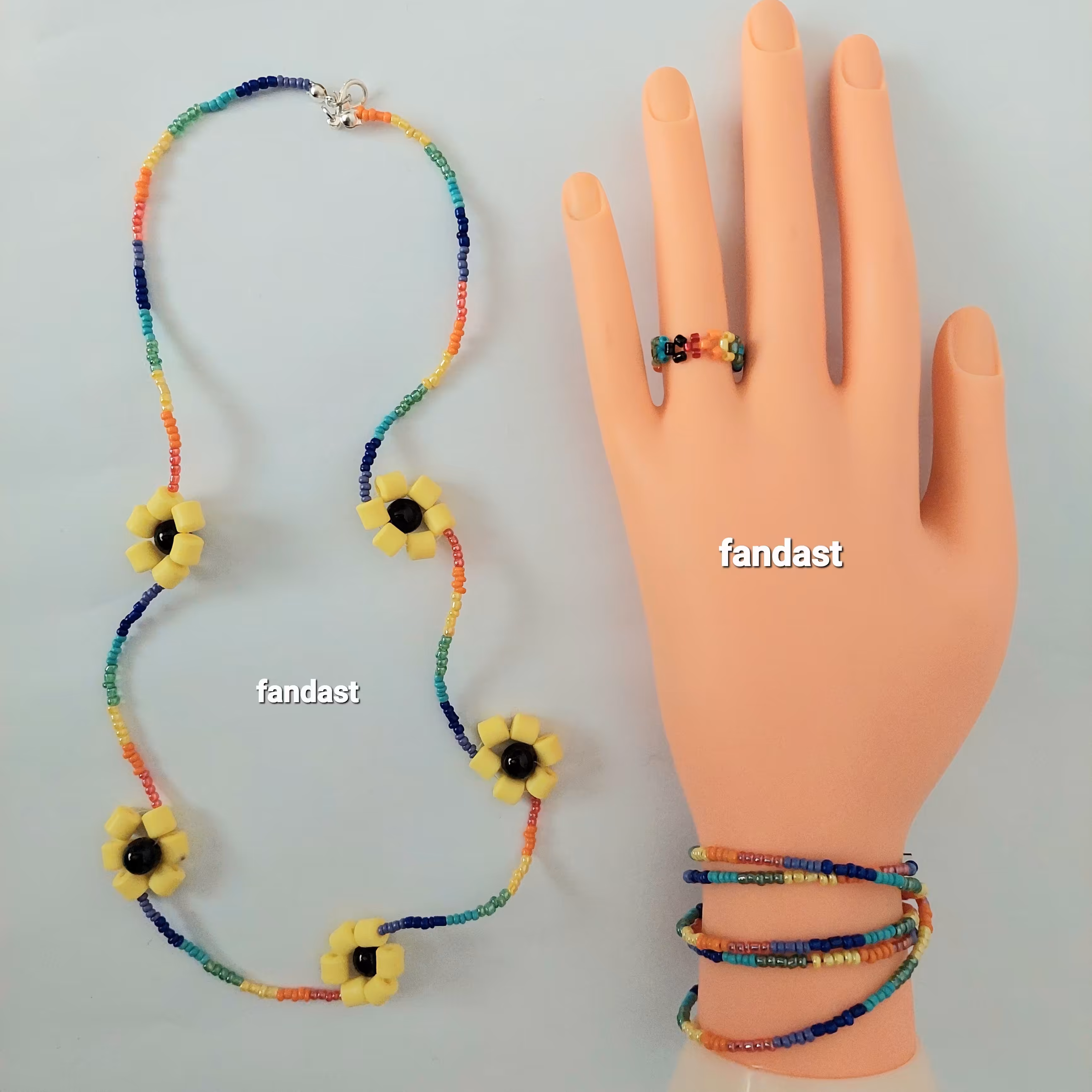 ست گردنبندودستبند و انگشتر طرح آفتابگردان کد22